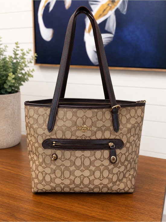 Coach Handbags - Coach Signature Taylor Canvas Tote in Tan with Dark Brown Trim
